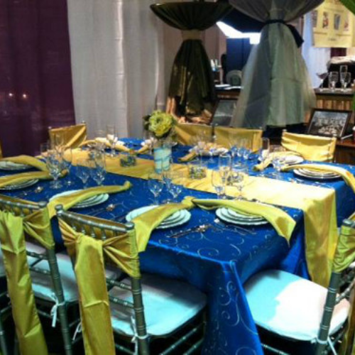 Table and chairs set up at an event