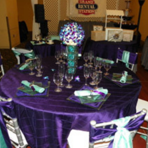 Table and chairs set up at an event
