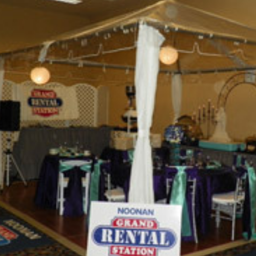 Table and chairs set up at an event